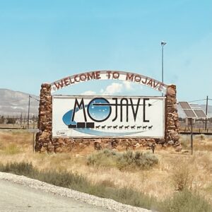 Welcome to Mojave, California sign. Wikimedia Commons image with attribution on source page.