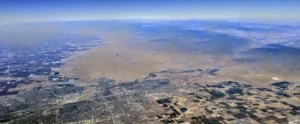 Aerial overview of Bakersfield and Kern River, photographed by Dicklyon CC BY-SA 4.0